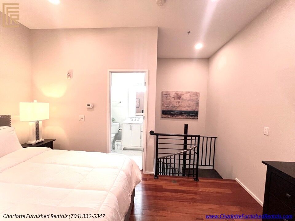 10-2084-euclid-avenue-bedroom-bathroom-access Bedroom with adjacent bathroom at 2084 Euclid Avenue furnished rental