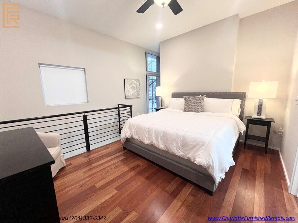 15-2084-euclid-avenue-bedroom-queen-bed-dilworth Queen bedroom at 2084 Euclid Avenue furnished rental in Dilworth Charlotte