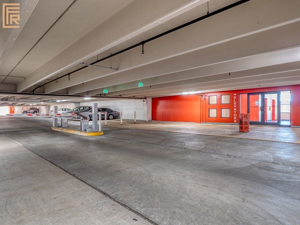 718-west-trade-unit-813-covered-parking-garage-gateway-village Covered parking garage at 718 West Trade Street Unit 813, a furnished rental in Gateway Village / Uptown Charlotte