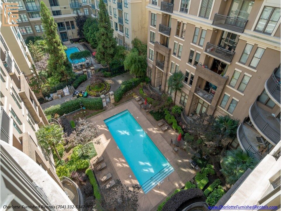718-west-trade-unit-813-pool-courtyard-from-above-uptown-charlotte Pool courtyard from above at 718 West Trade Street Unit 813, a furnished rental in Uptown Charlotte
