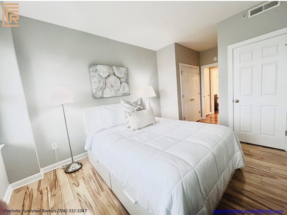 718-west-trade-unit-813-second-bedroom-uptown-charlotte Second bedroom at 718 West Trade Street Unit 813, a furnished rental in Uptown Charlotte