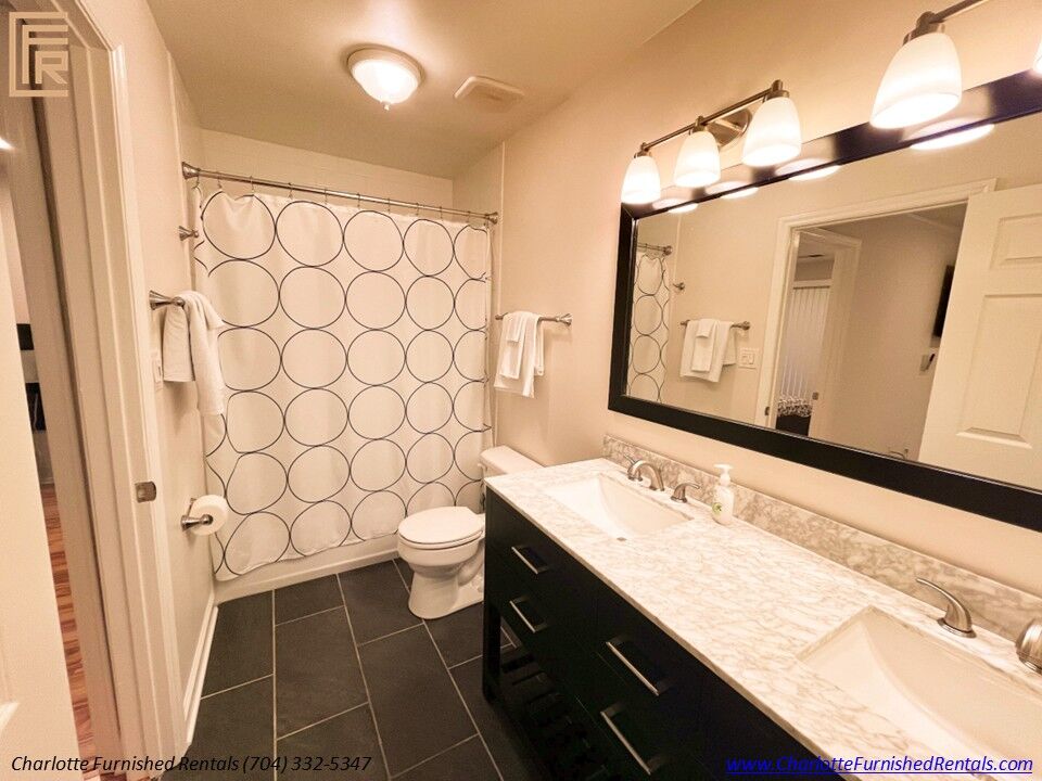 Bathroom with Double Vanity | 2510 Cranbrook Lane Unit 20 Bathroom with double vanity at 2510 Cranbrook Lane Unit 20 Charlotte NC