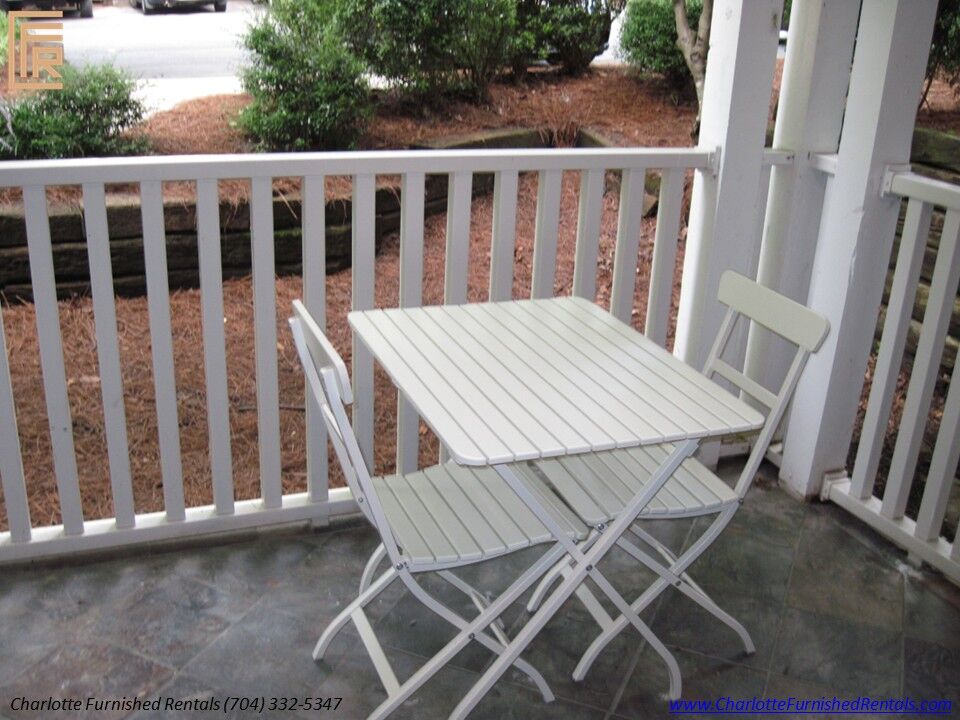 Private Patio | 2510 Cranbrook Lane Unit 20 Private patio with outdoor table at 2510 Cranbrook Lane Unit 20 Charlotte NC