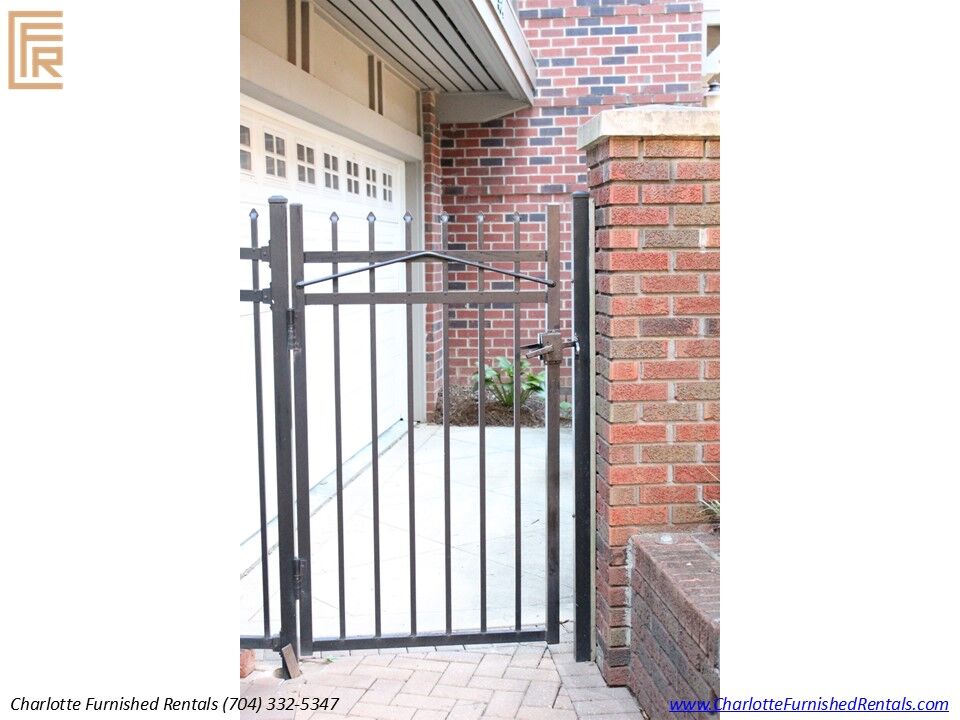 Slide14 Secure landscaped courtyard providing a peaceful outdoor gathering space.