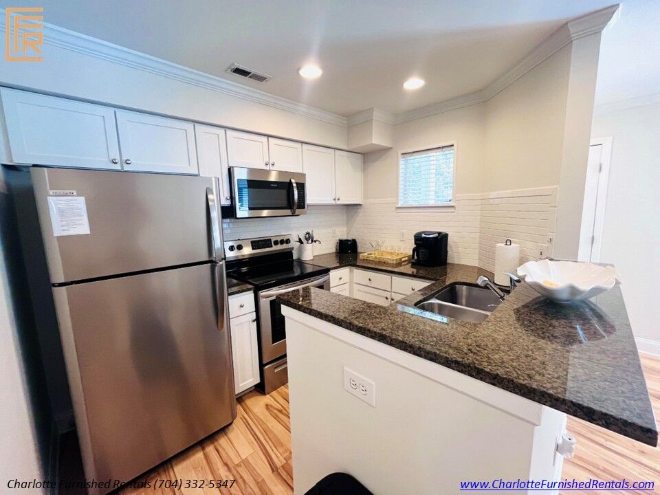 Updated Kitchen | 2510 Cranbrook Lane Unit 20 Updated kitchen with stainless appliances at 2510 Cranbrook Lane Unit 20 Charlotte